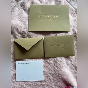 3 Burberry envelopes and 1 postcard